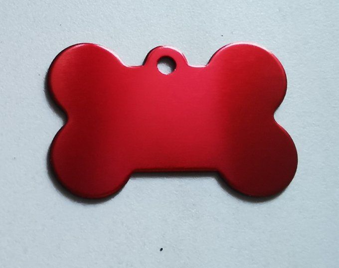 Médaille en forme d'os  