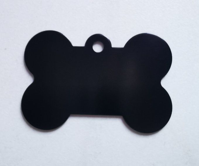 Médaille en forme d'os  