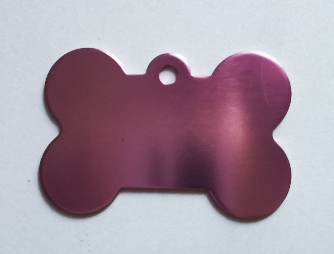 Médaille en forme d'os  